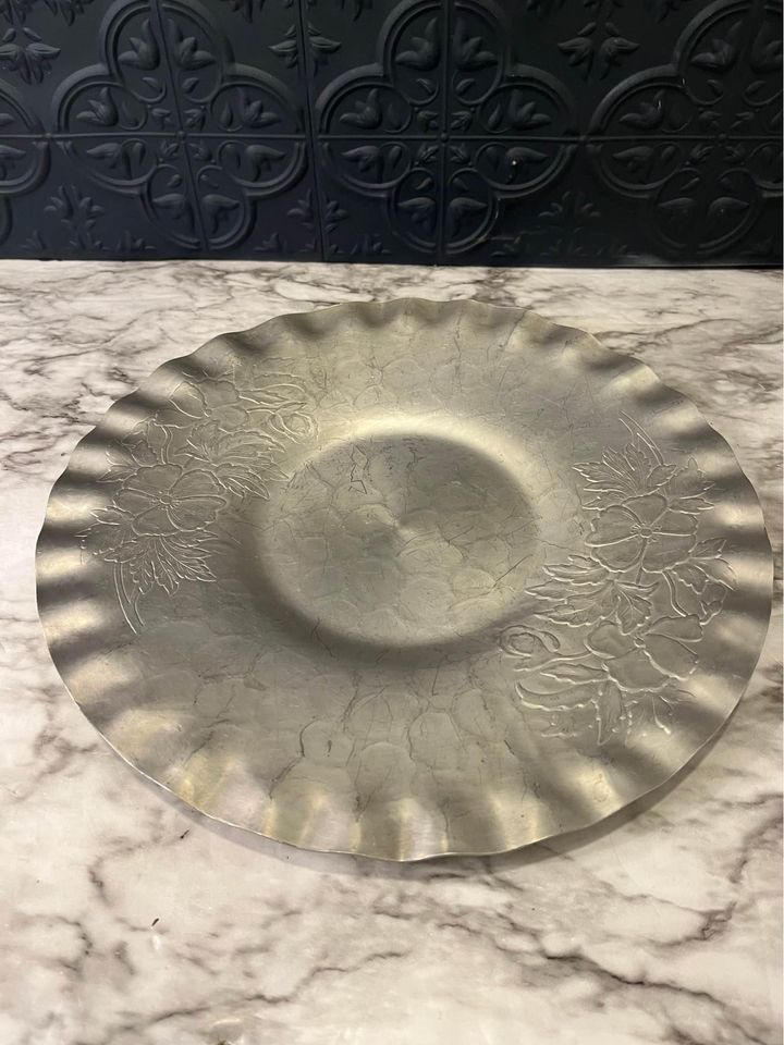 Pewter plate with flowers