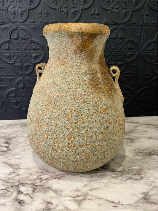 Rough tan pottery jug