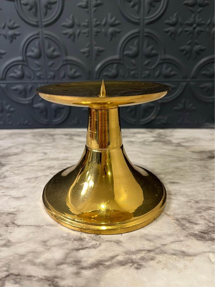 shiny brass pedestal candle holder with spike