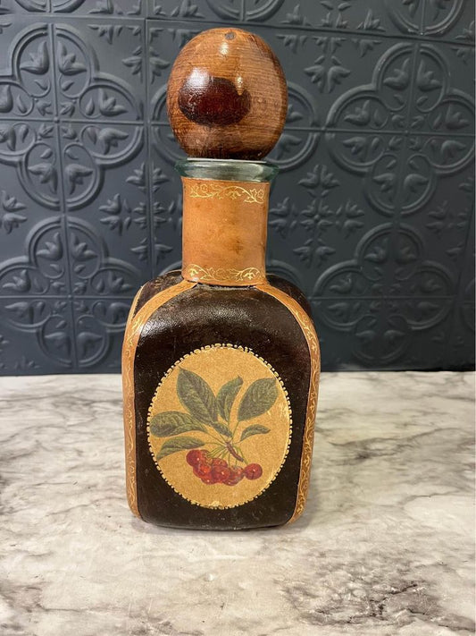 Brown Leather Wrapped Decanter with fruit