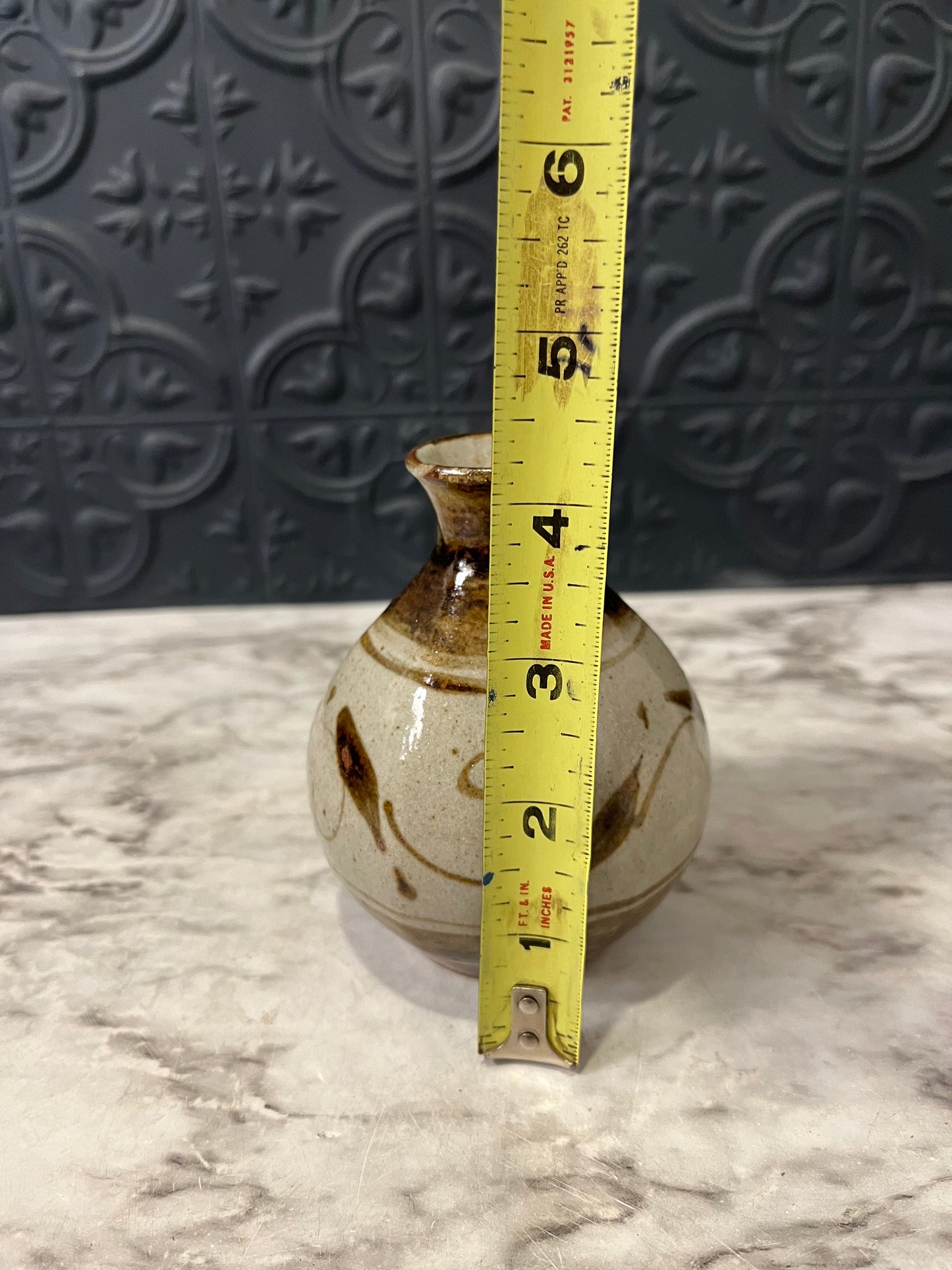 Small Tan Pottery Vase with Brown Leaf design