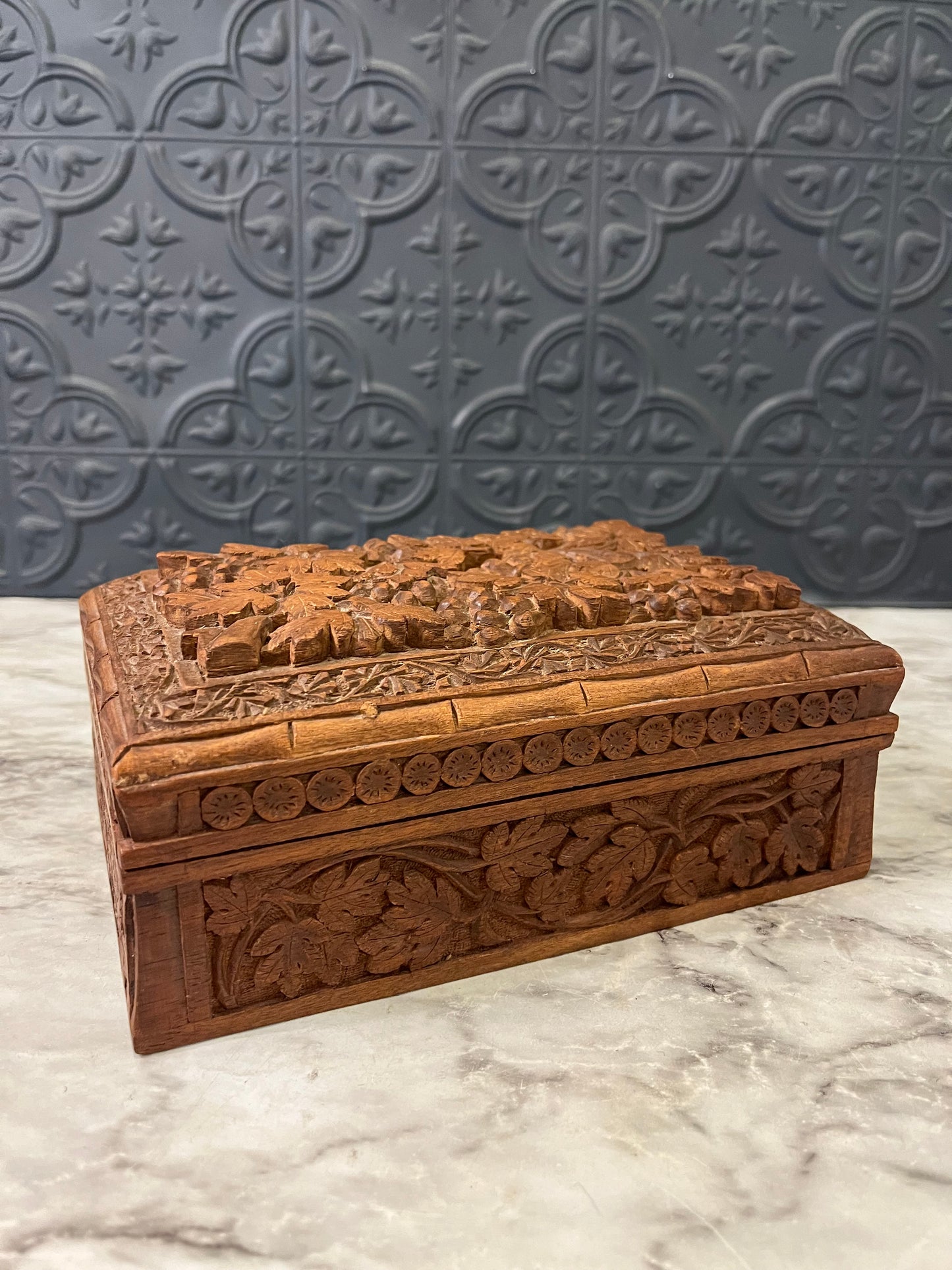 Intricately Carved Wood Box with Leaves