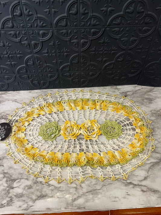 Yellow and green crochet doily