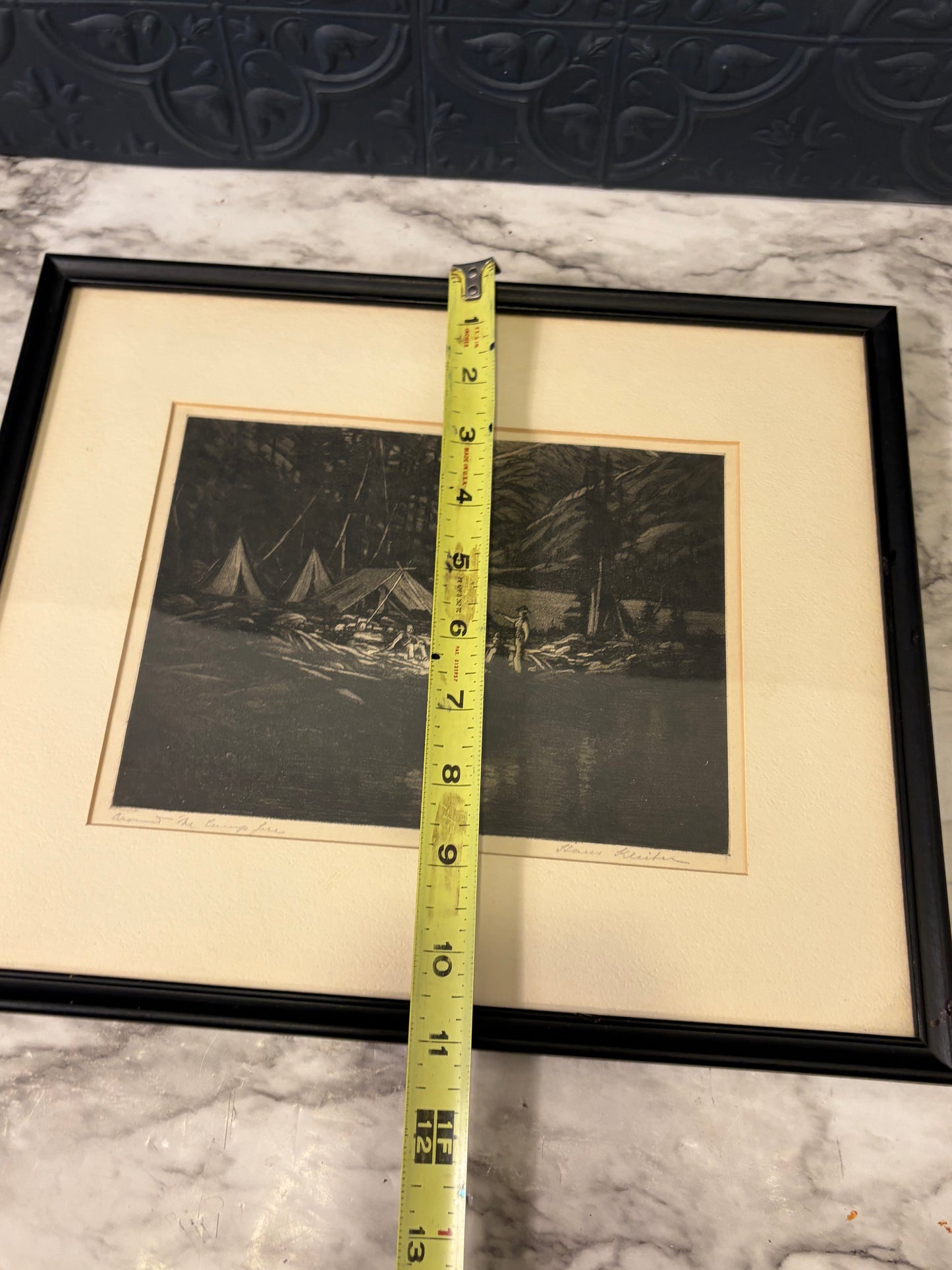 Framed Print of "Around the Camp Fire" by Hans Kleiber