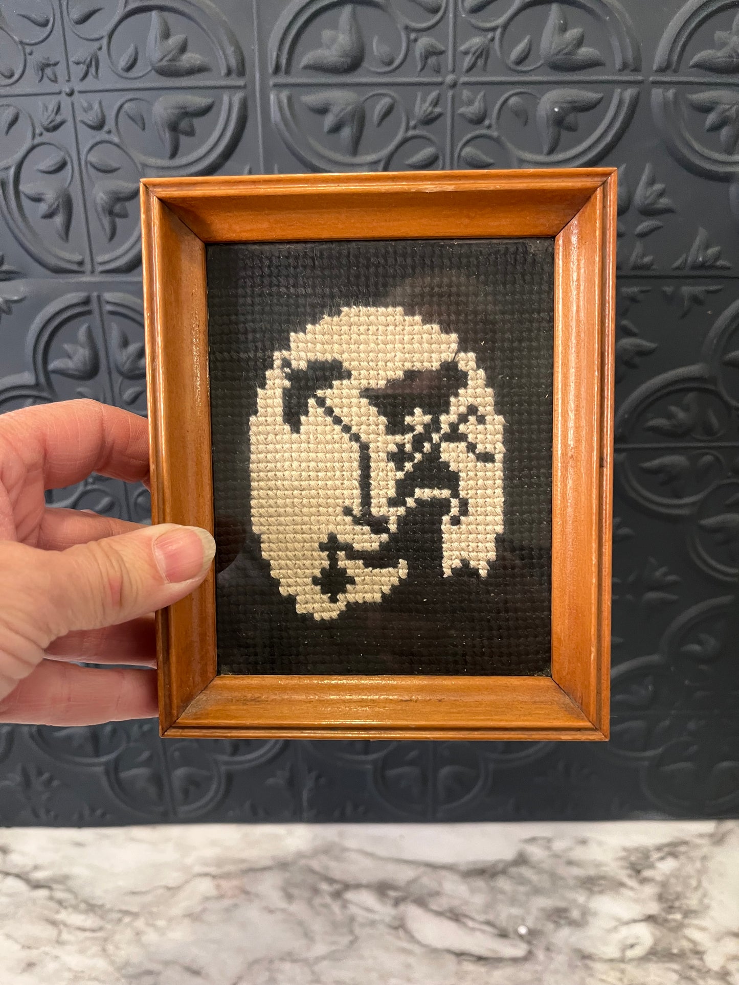 Black and white cross stitch woman