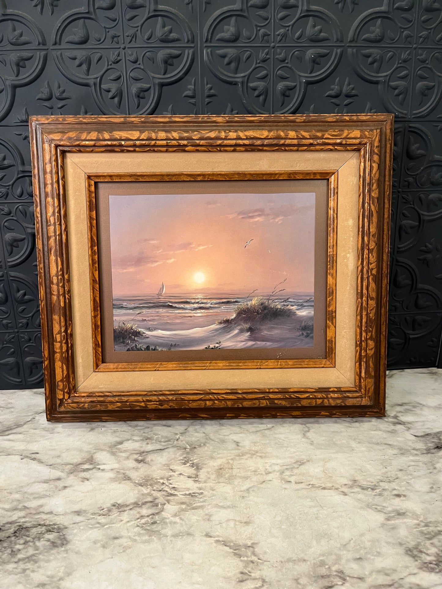 Ocean print in frame with cream velvet mat