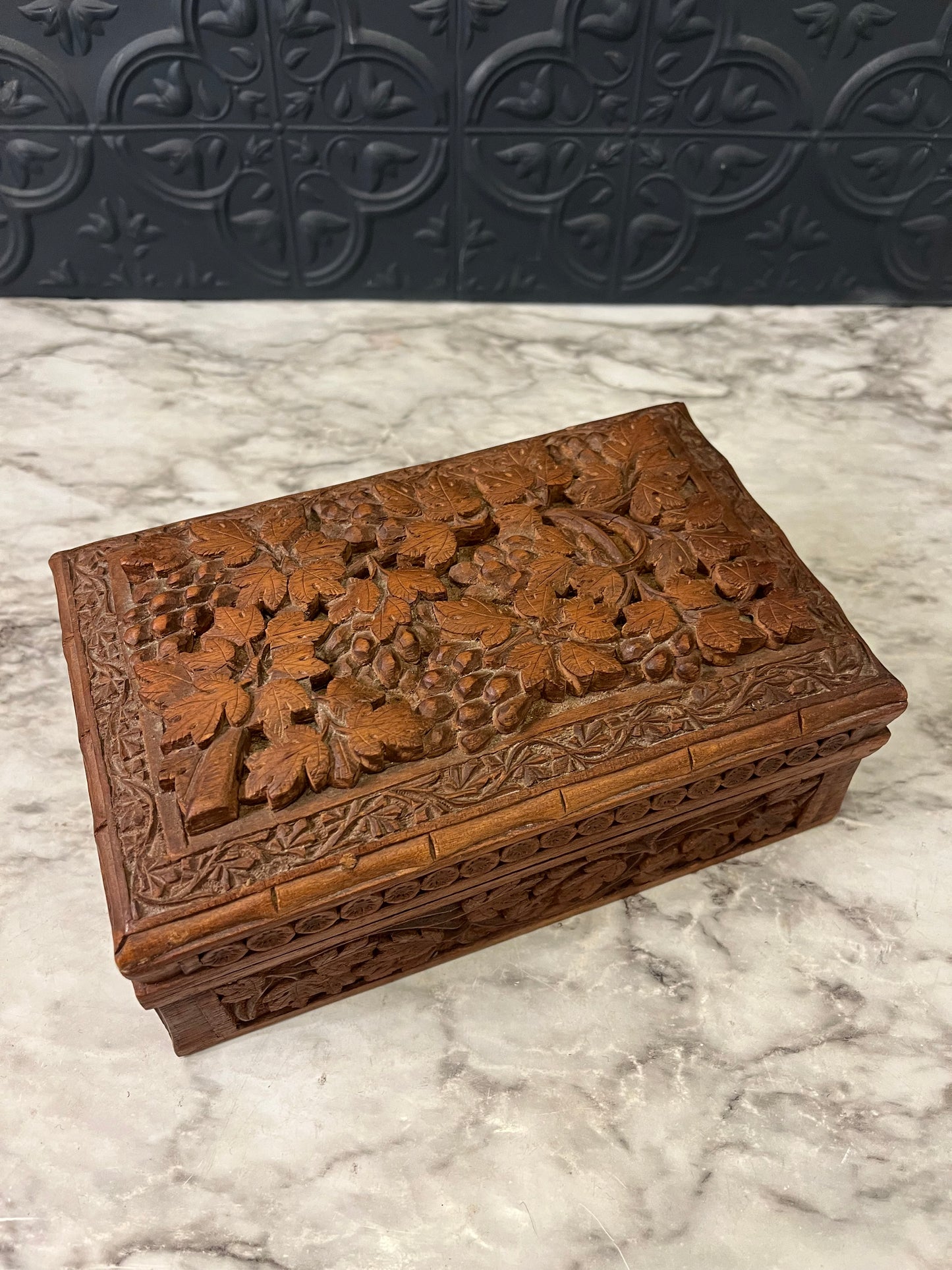 Intricately Carved Wood Box with Leaves