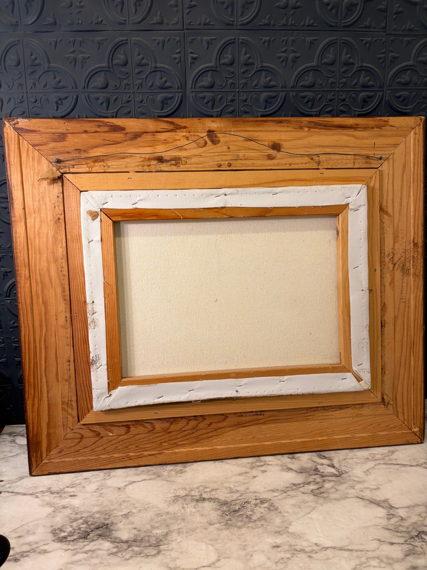 Muted Coastal Oil Painting in Dark Wood Frame