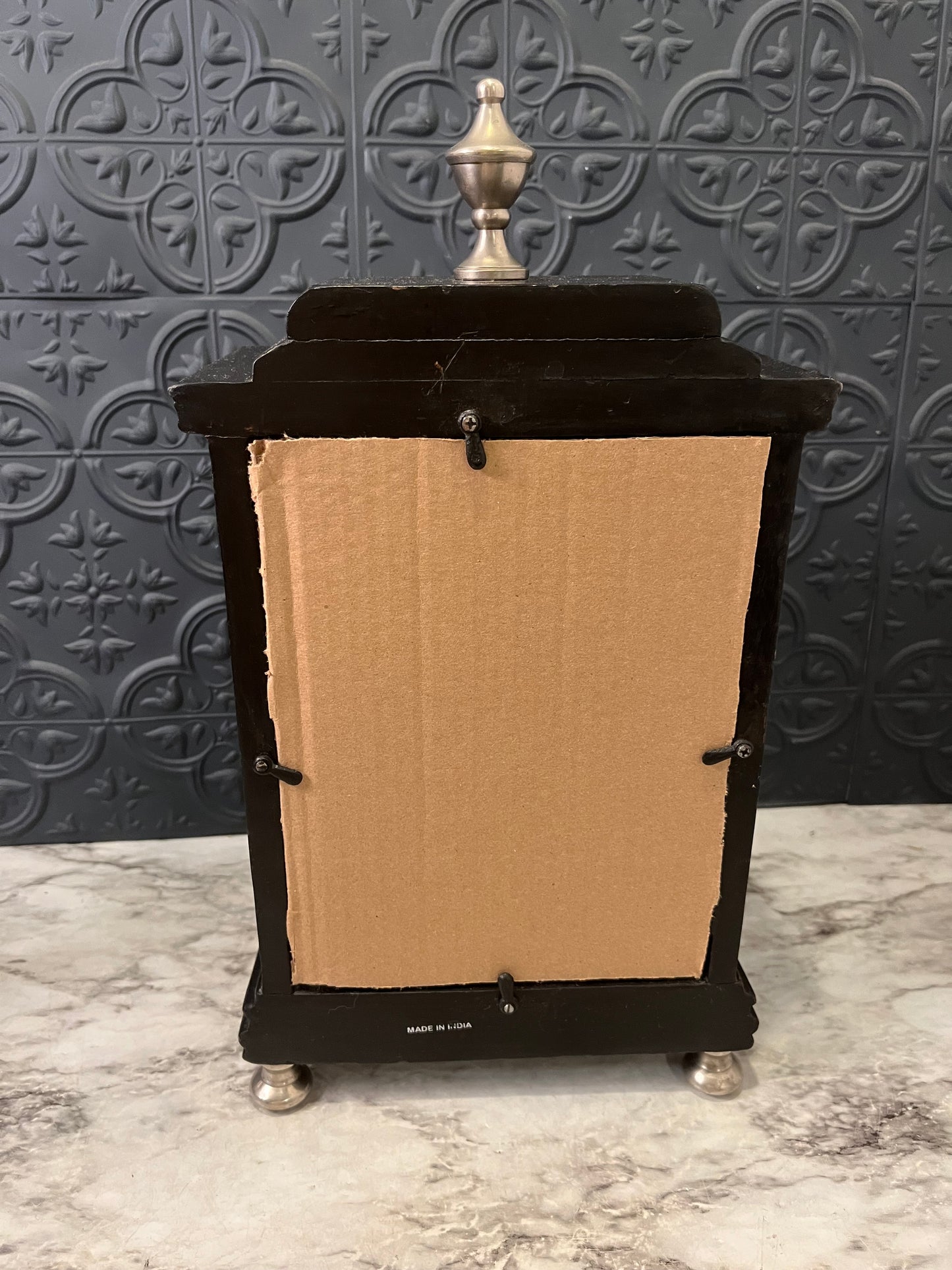 Black and tin Bracket Clock