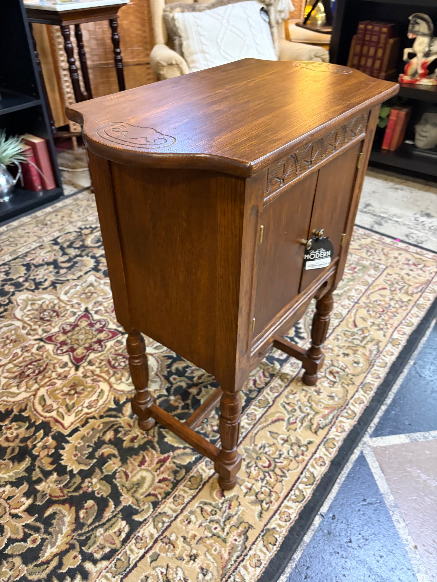 Antique Wood Cabinet with Carved Details