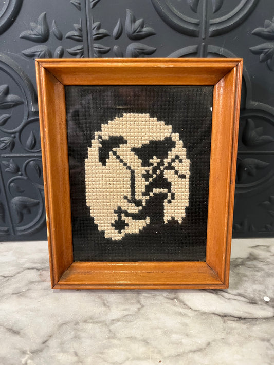 Black and white cross stitch woman