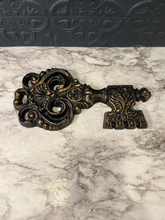 Black and Gold Metal Key