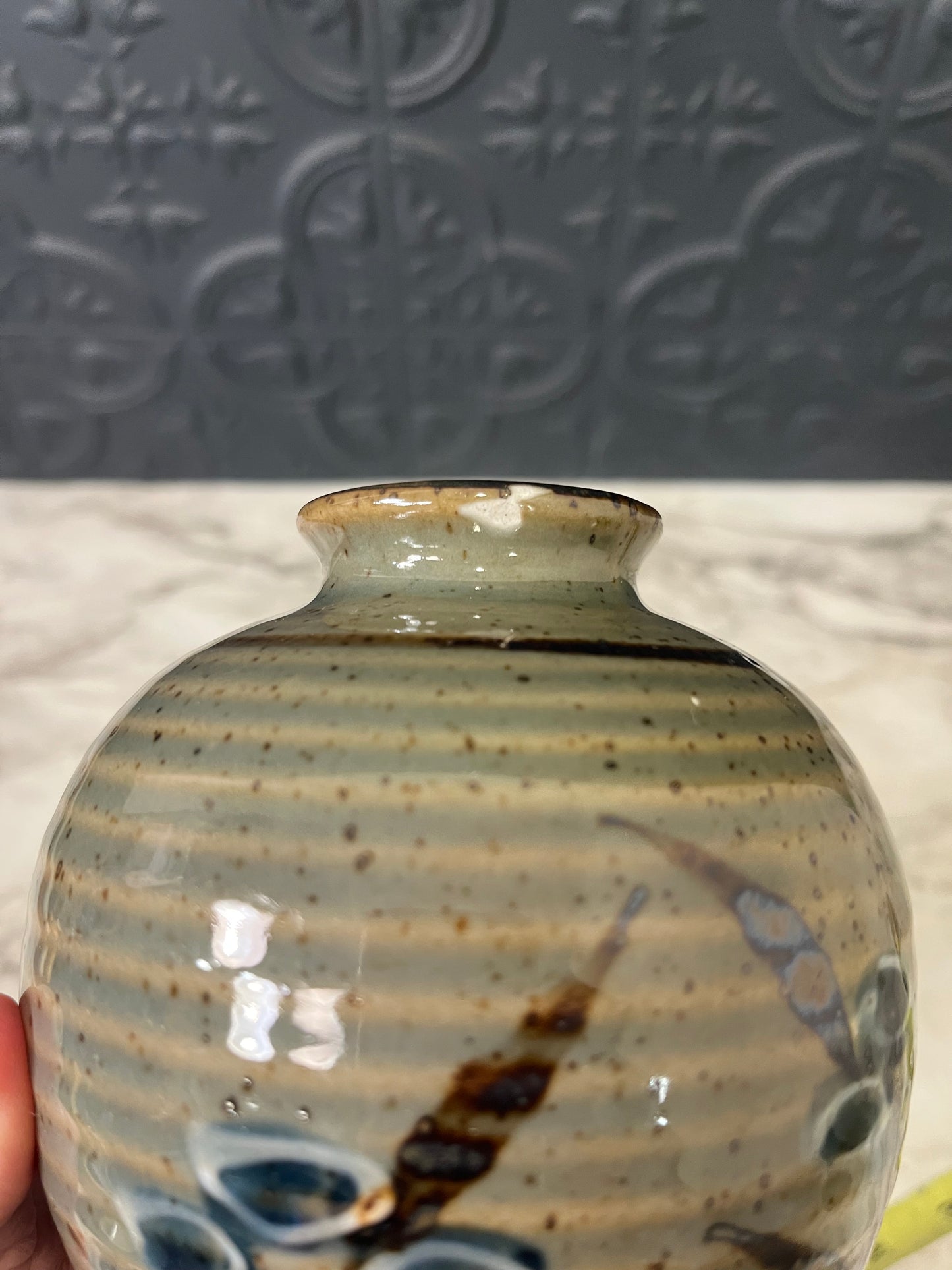 Small Ribbed Pottery Vase with Flowers