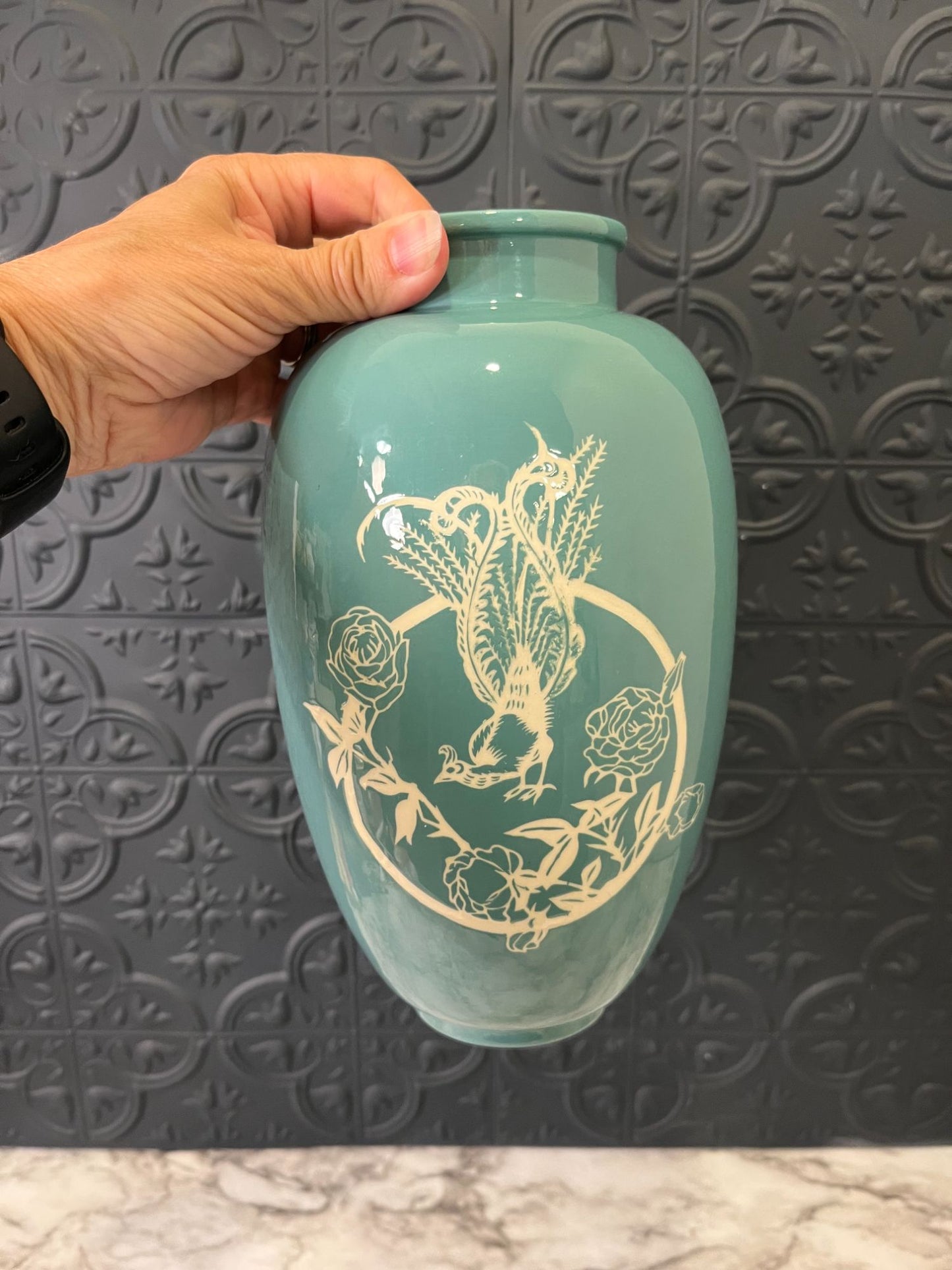 Blue vase with rooster