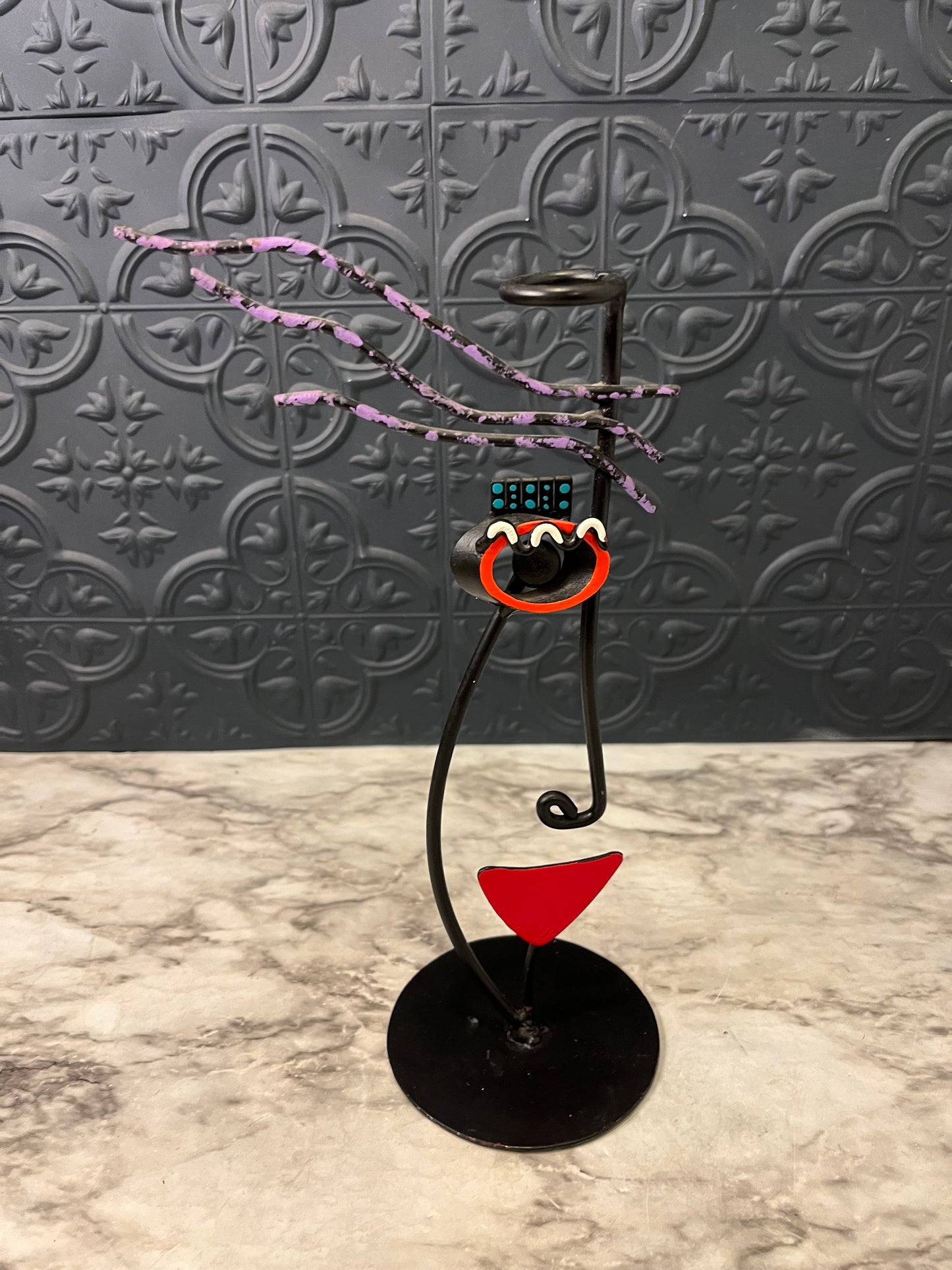 Metal abstract candle holder
