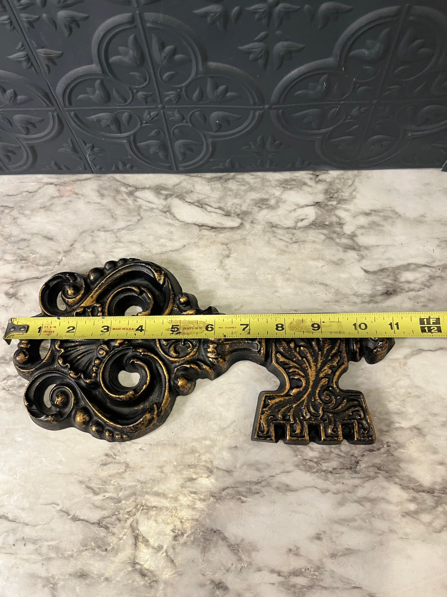 Black and Gold Metal Key
