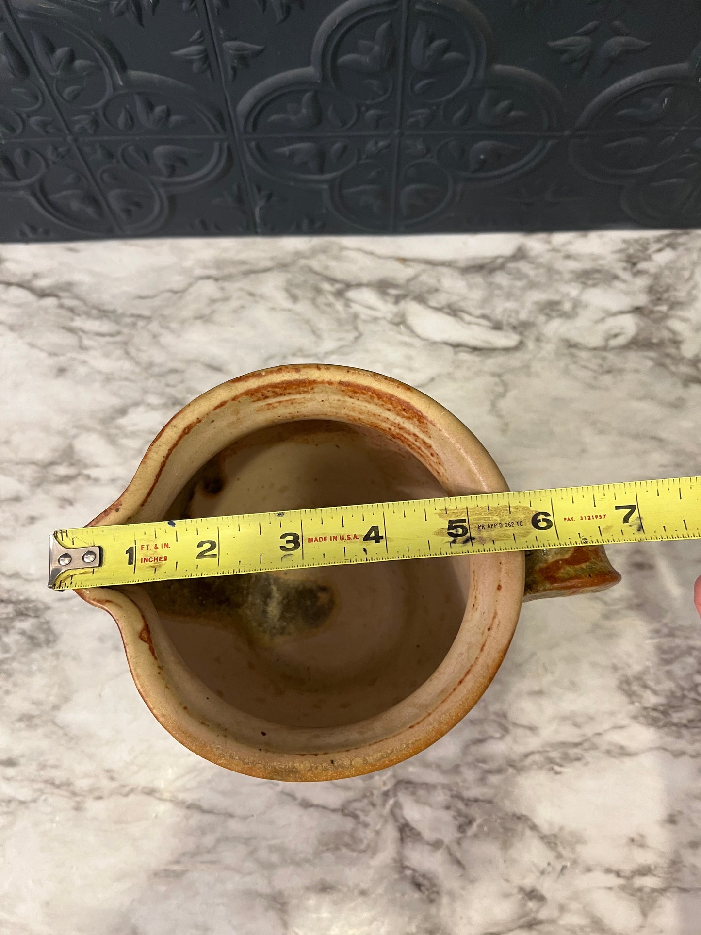 Brown Pottery Pitcher Light colored Rim