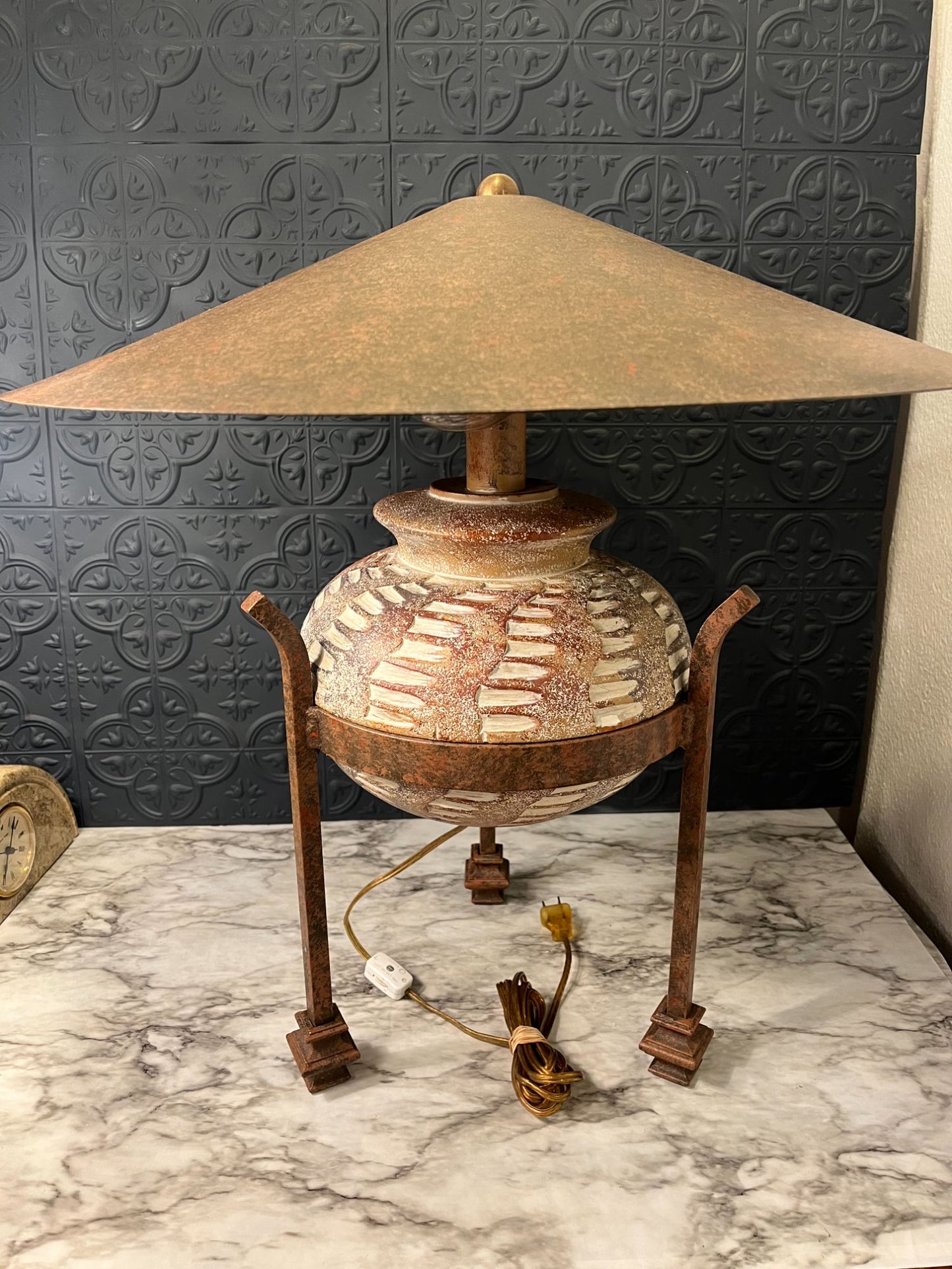 Metal and pottery lamp