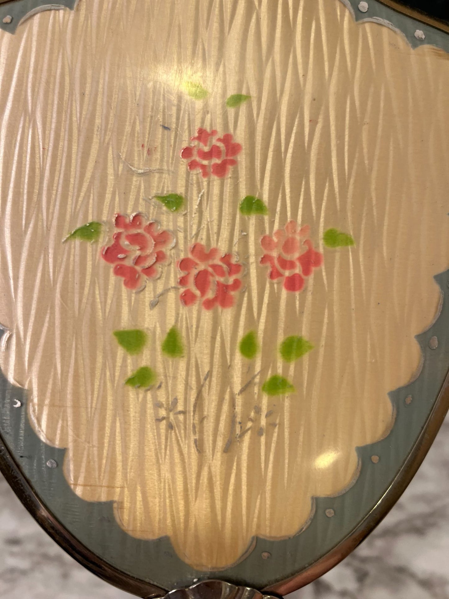 Vintage hand mirror with pink flowers