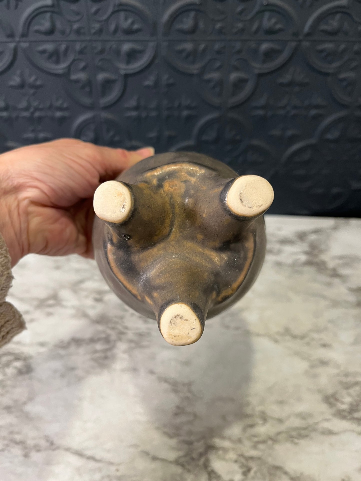 Green and Brown planter with 3 feet