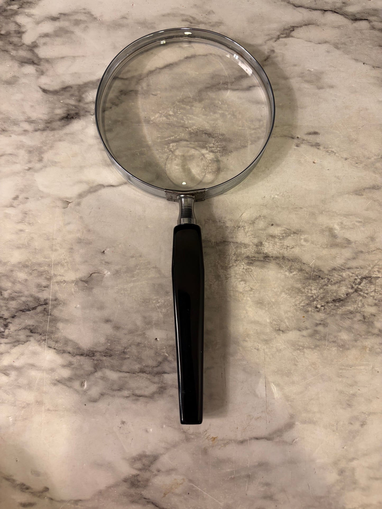 Handheld Magnifying Glass with Black Handle