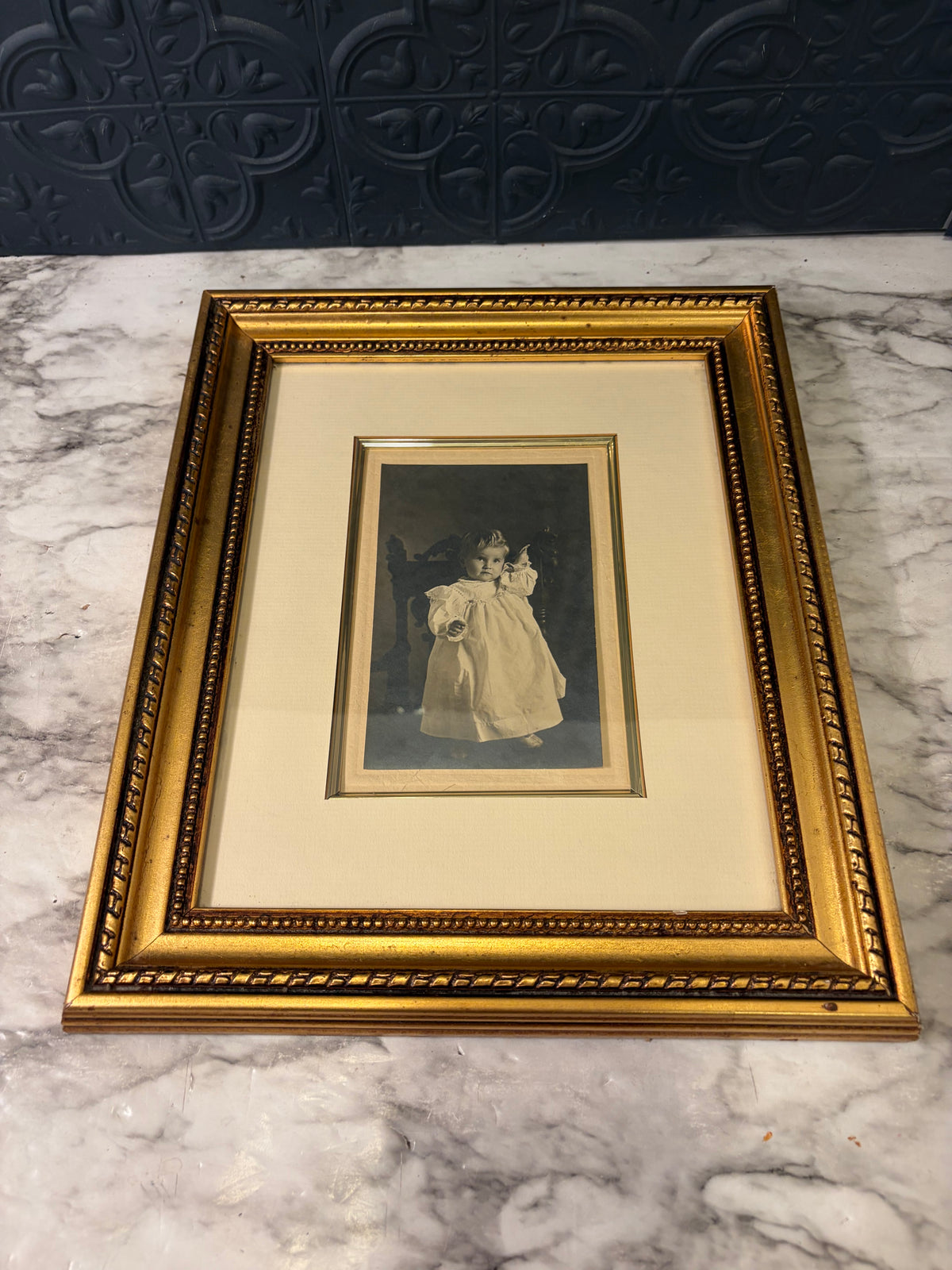 Gold Framed Antique Photo of Child in White Dress