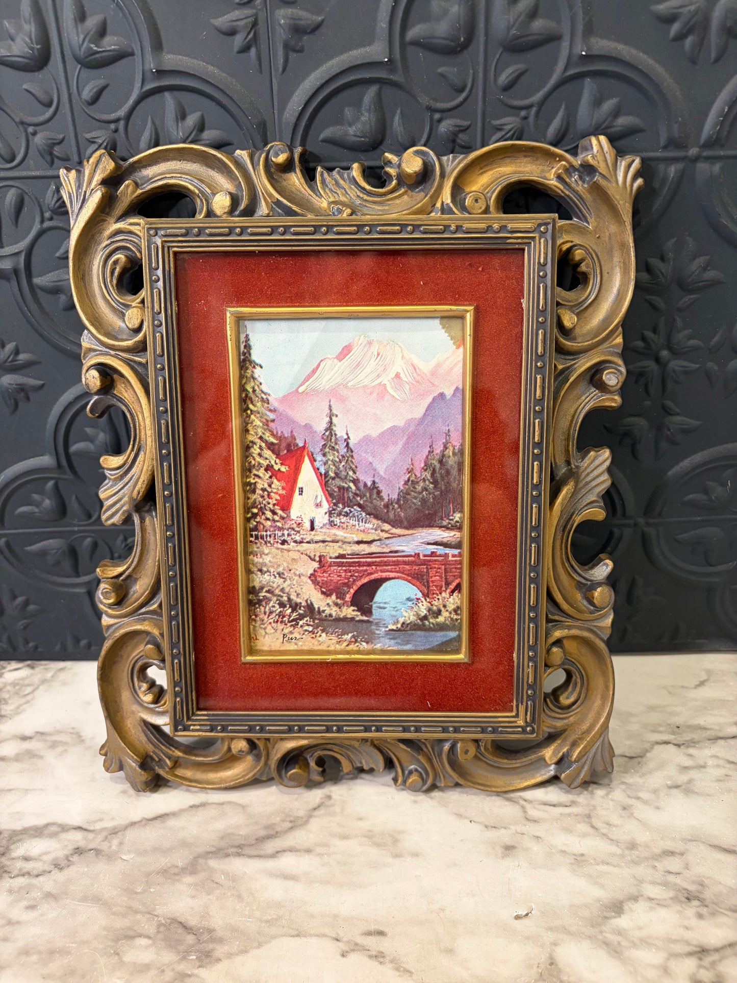 Black and Gold Molded Frame of Bridge