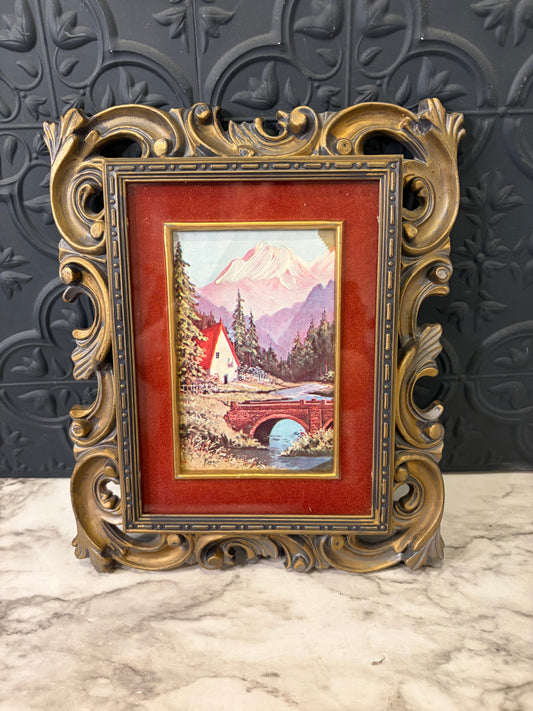 Black and Gold Molded Frame of Bridge