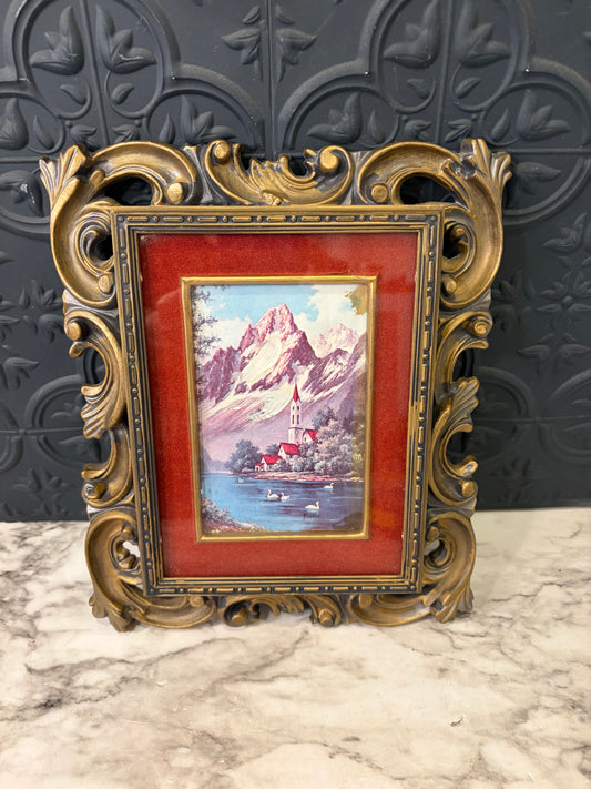 Black and Gold Molded Frame of Snow Covered Mountain