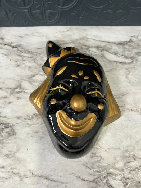 Gold and black Clown head
