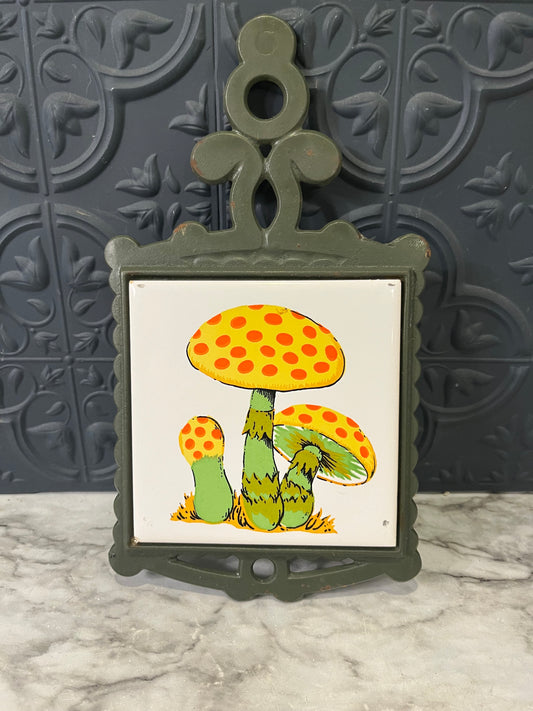 Vintage Yellow and Orange Mushroom Tile Trivet and Cast Iron