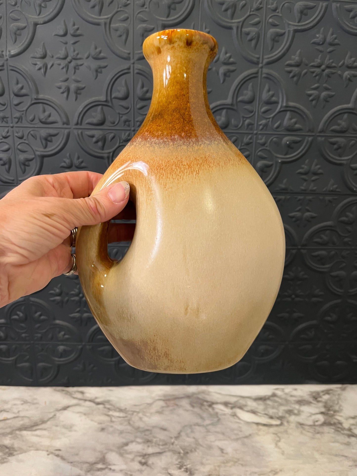 Tan Ceramic Vase with Brown Rim and Modern Handle design