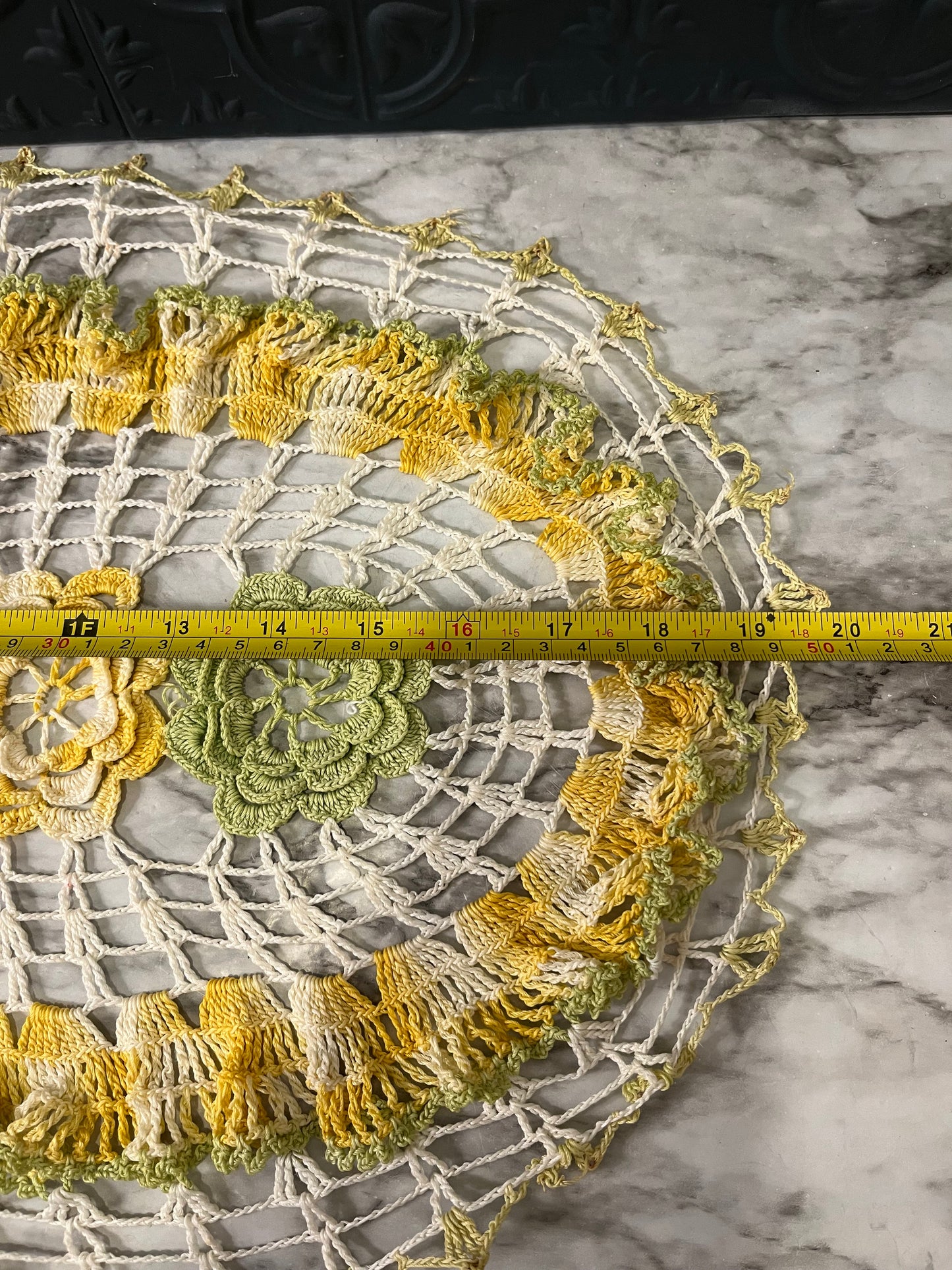 Yellow and green crochet doily