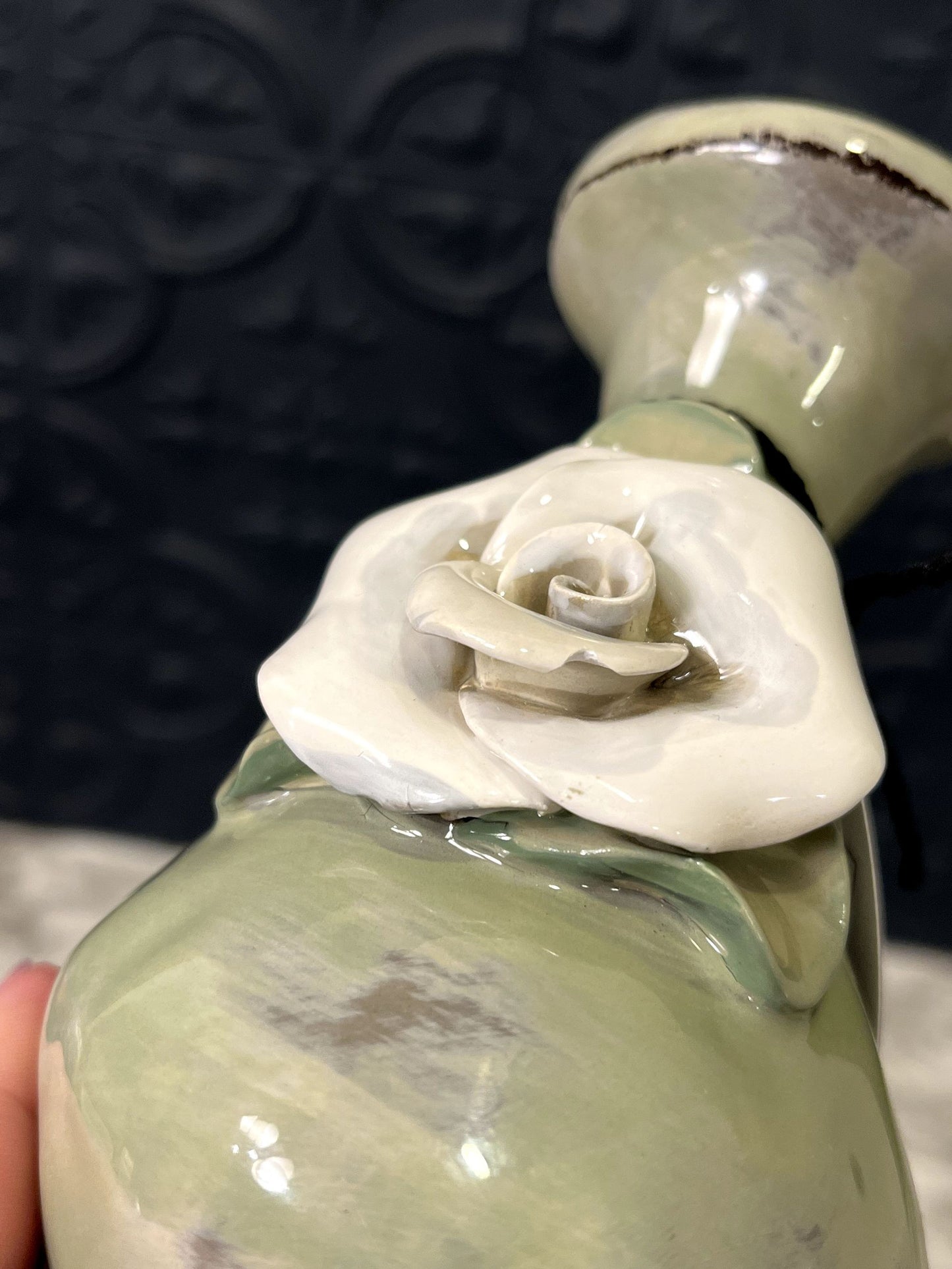 Green Pottery Vase With White Rose