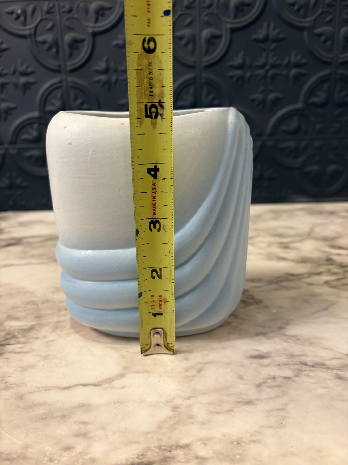 Blue Vase with Curved Geometric Design