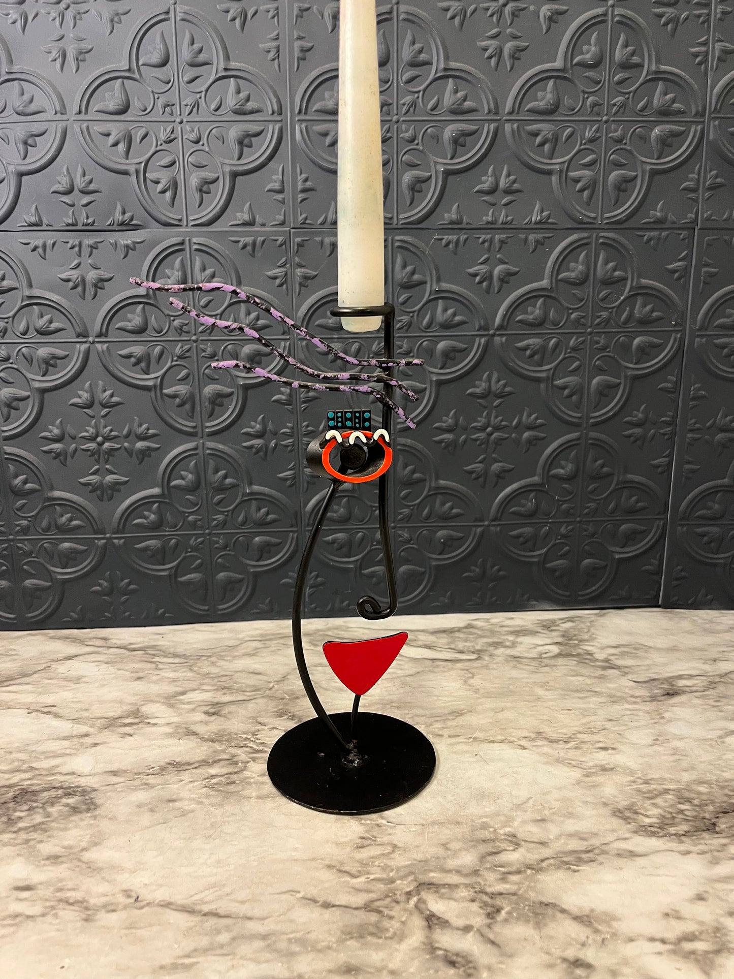Metal abstract candle holder