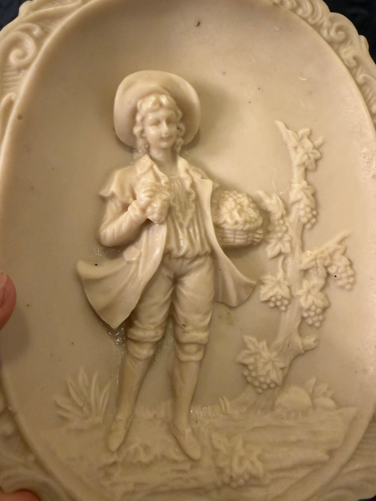 Bisque 3D Plaque of Woman Holding Basket of Fruit