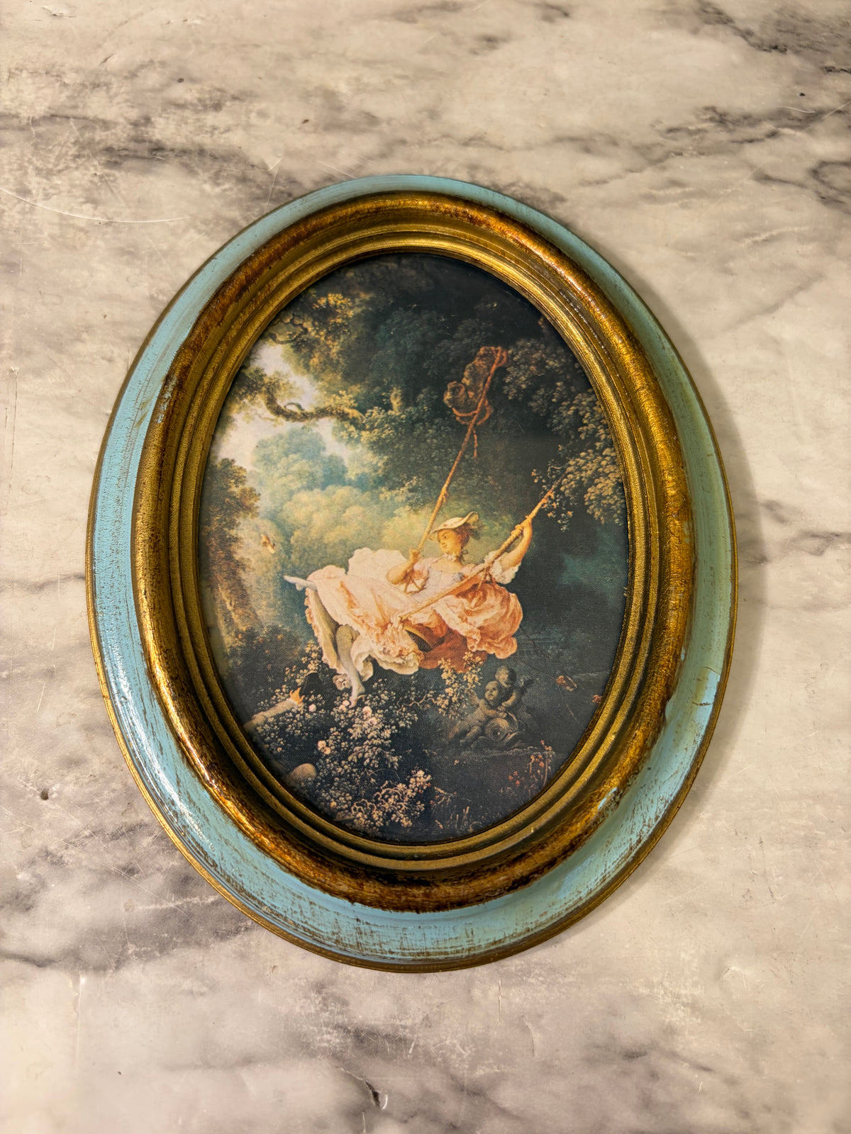 Oval Plastic Framed Print of "The Swing"