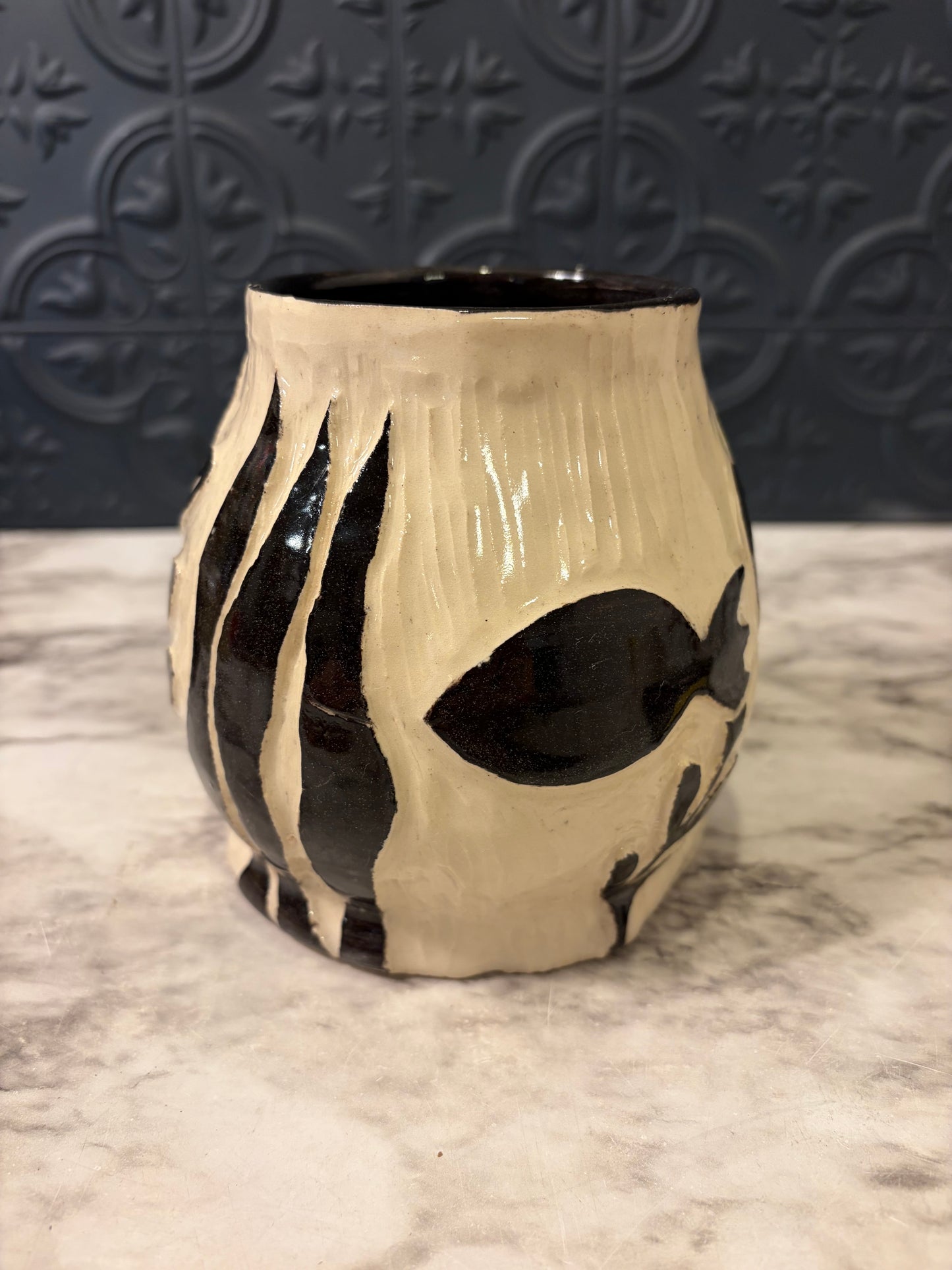 Cream Pottery With Brown Fish and Seaweed