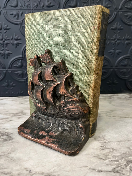 Metal ship bookend or Doorstop