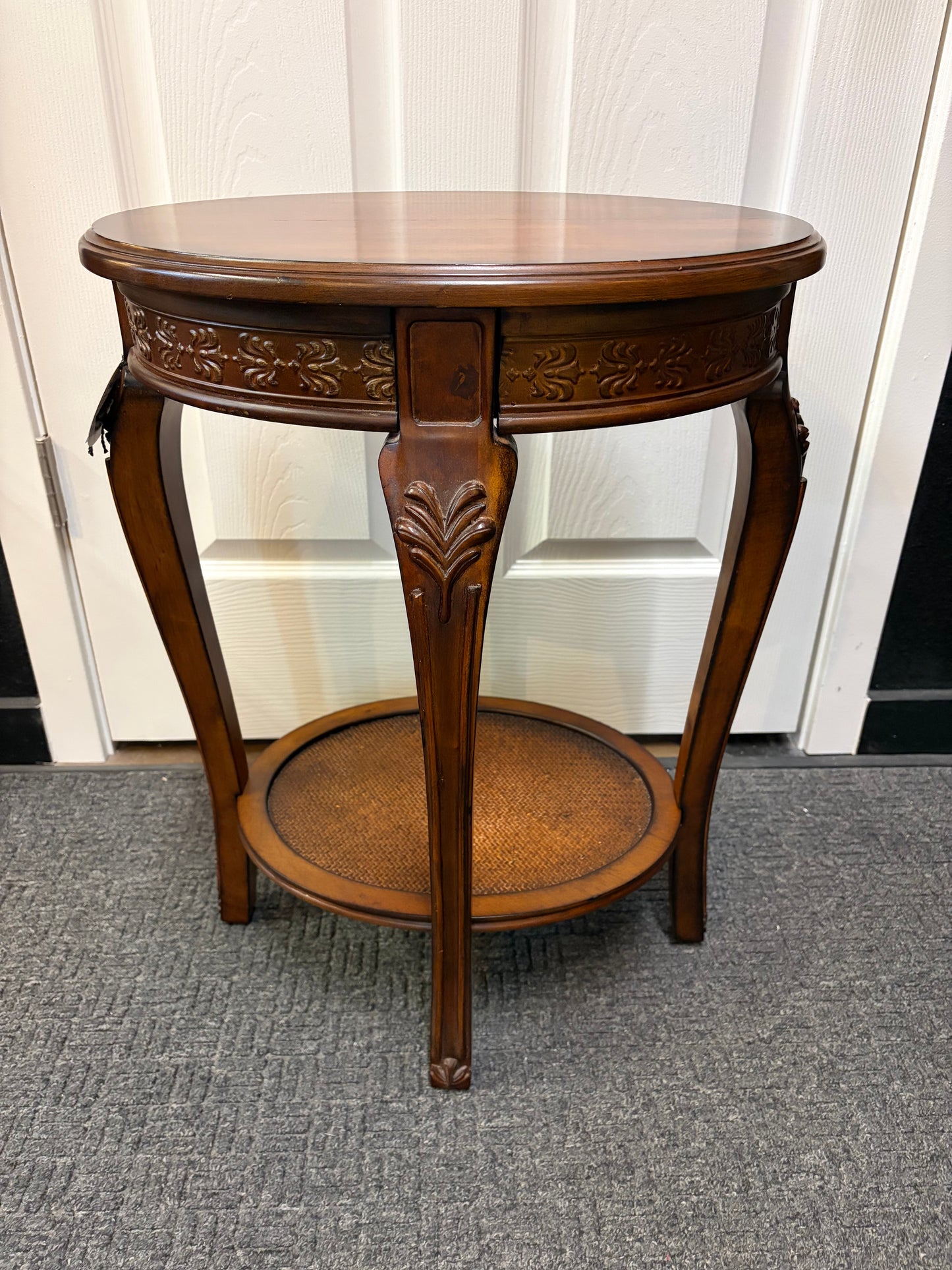 Dark Wood Oval Table with Rattan