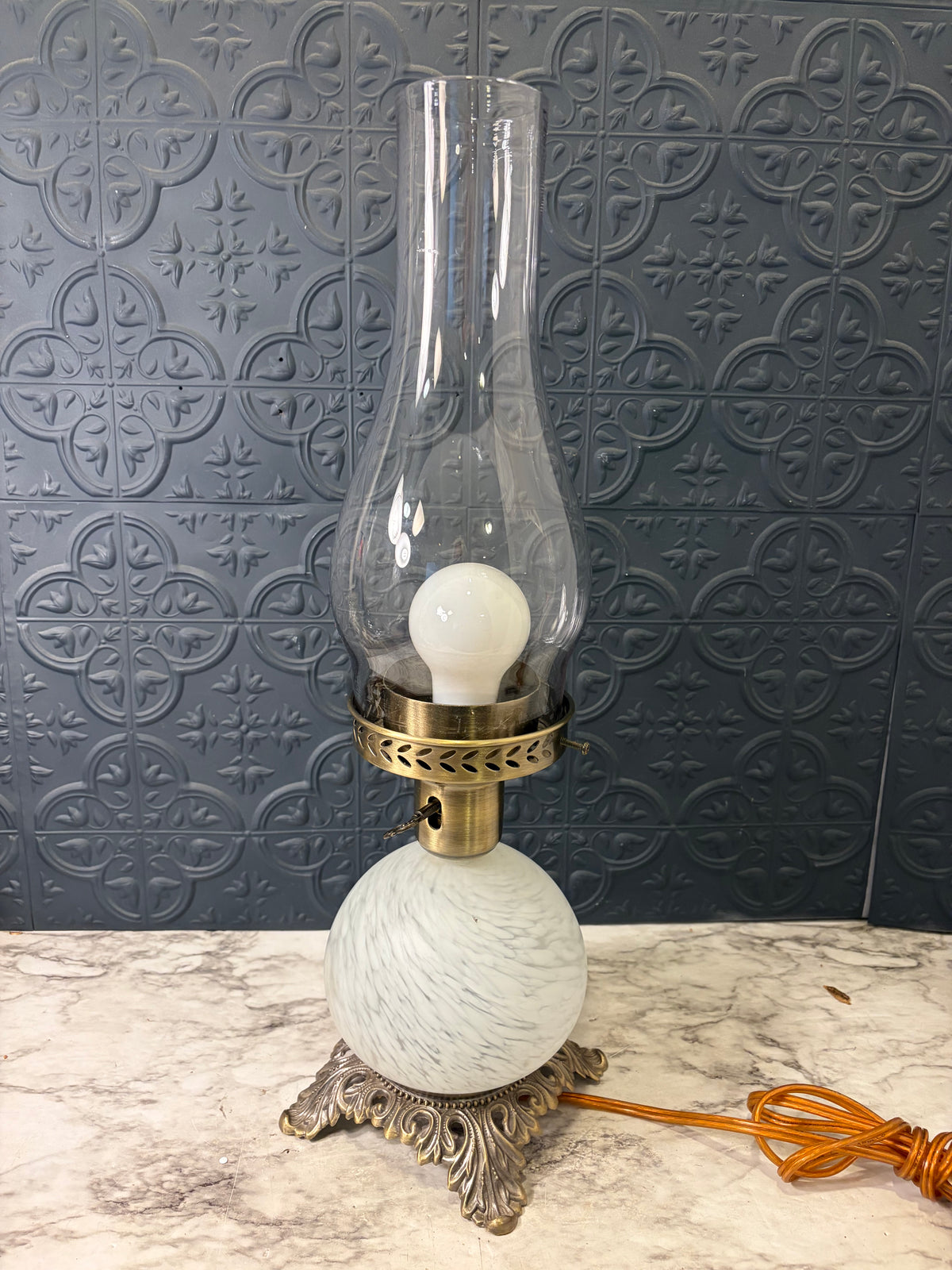 Vintage Brass lamp with round Glass ball and hurricane shade