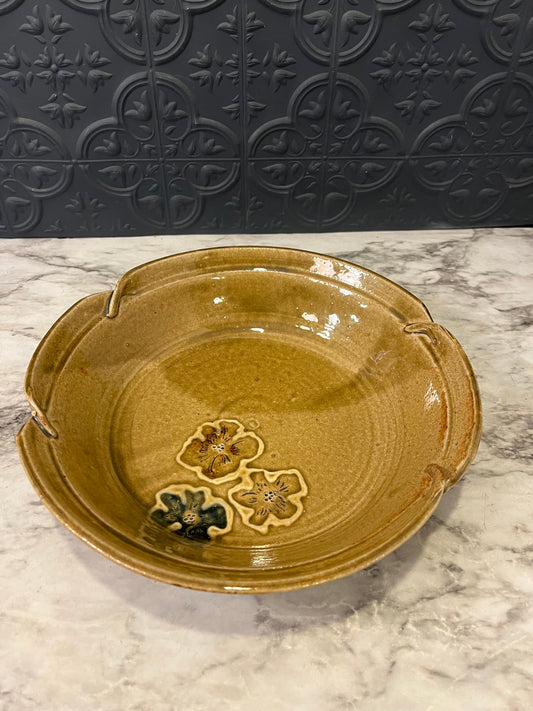 Pottery bowl with three flowers