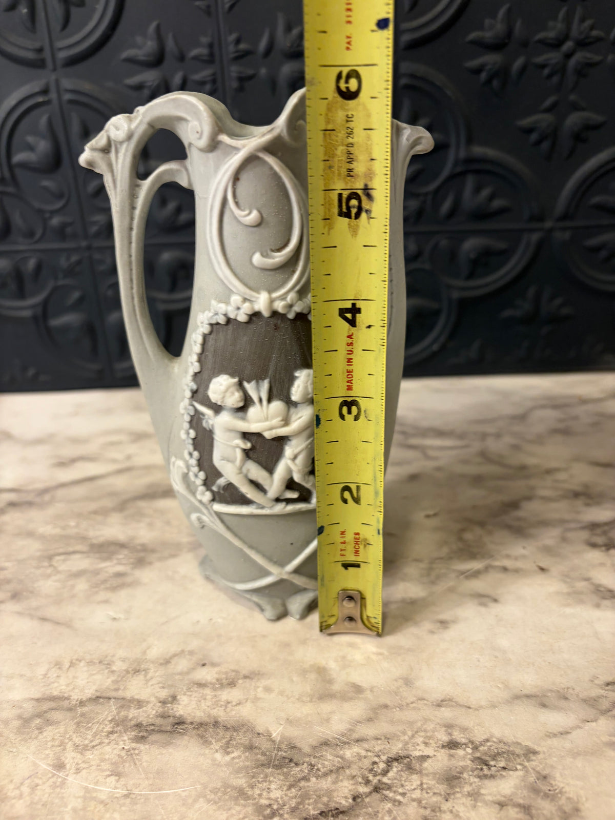 Double Handle Bisque Porcelain Vase with Cherubs