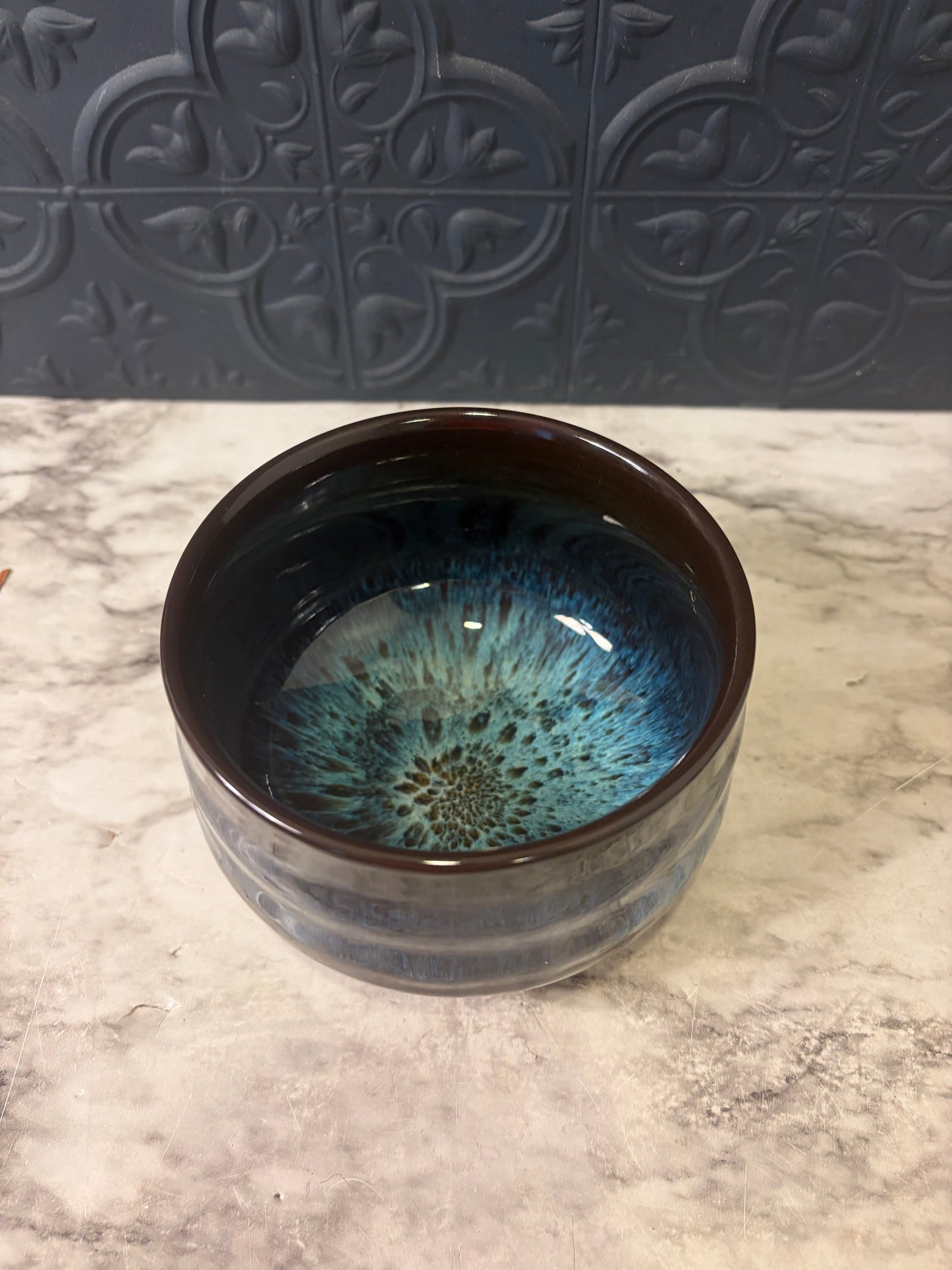 Jianzhan Ceramic Tea Bowl with Vibrant Blue Starburst