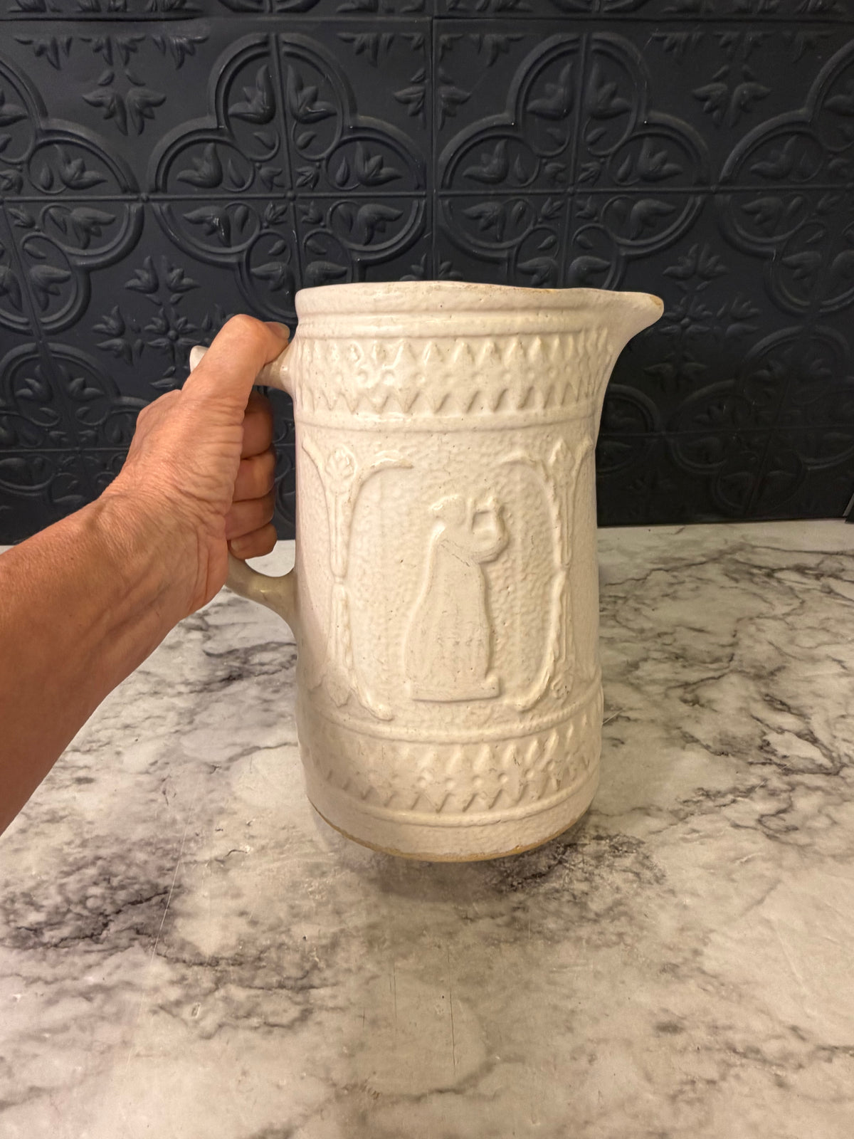 1920's Stoneware Pitcher with Relief RRP Co