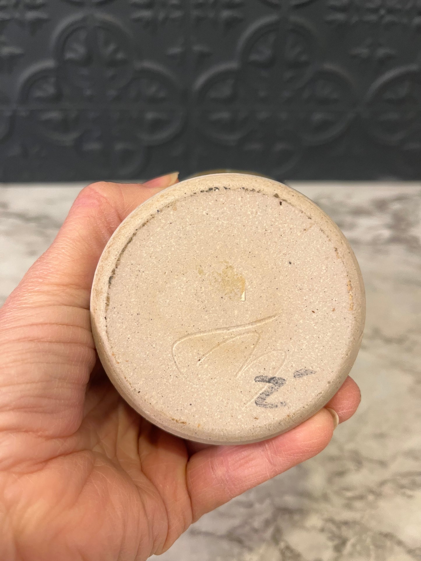 Pottery vase with Grape design