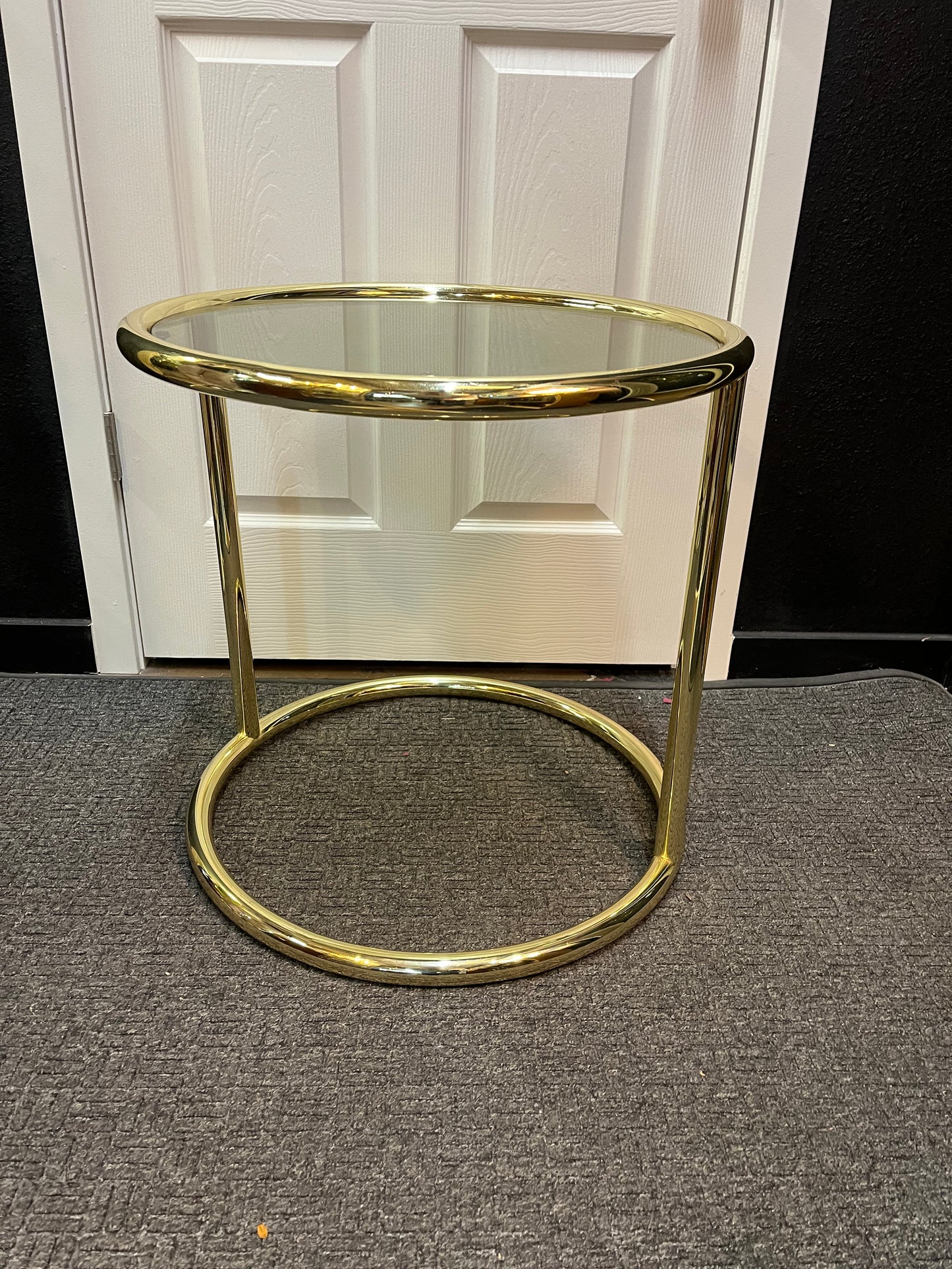 Round Brass side table with smoke glass