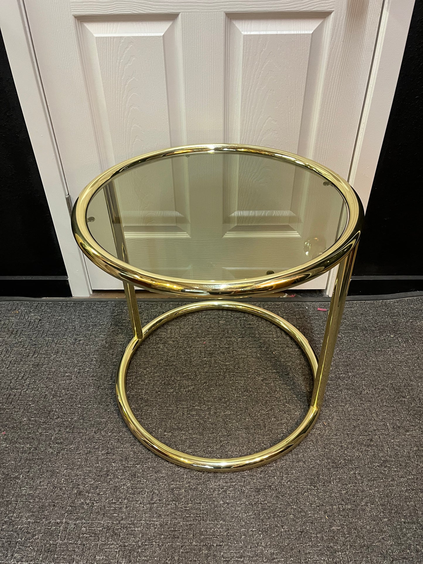 Round Brass side table with smoke glass