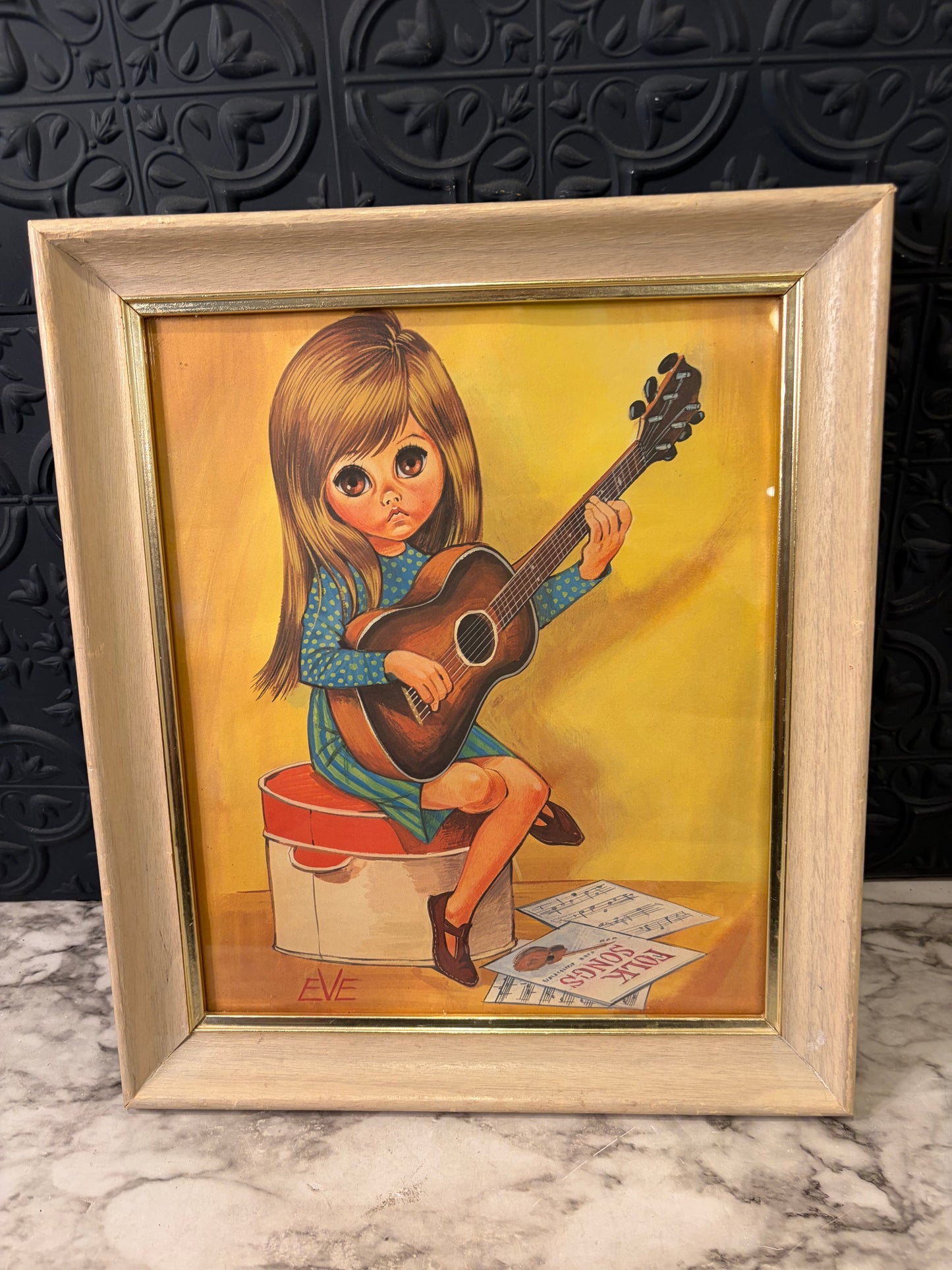 Eve Big Eye Girl Playing Guitar
